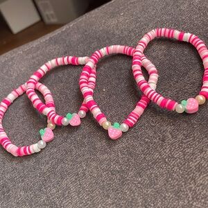Pink and White Beaded Bracelets with Strawberry Charms